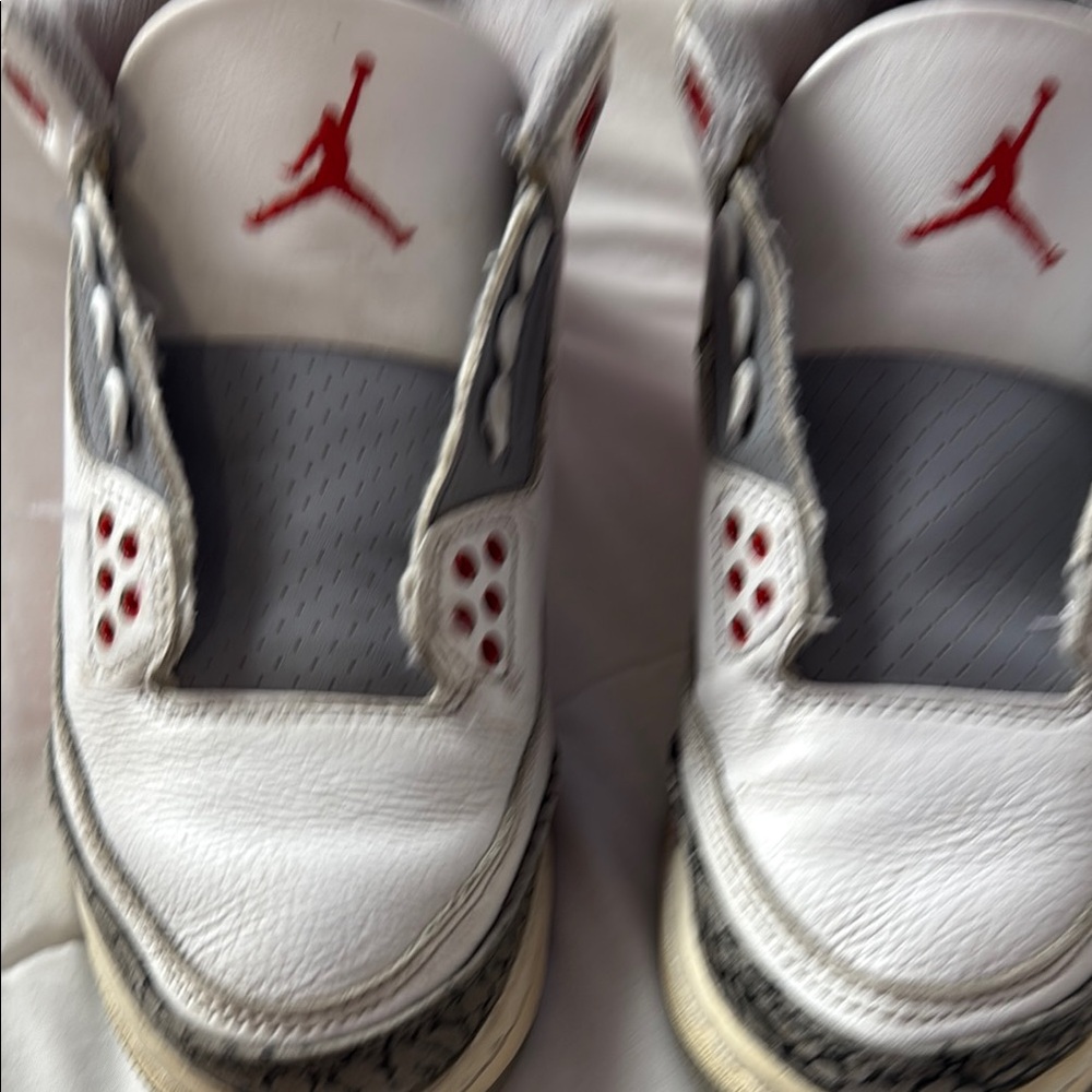 Air Jordan White and Red Sneakers